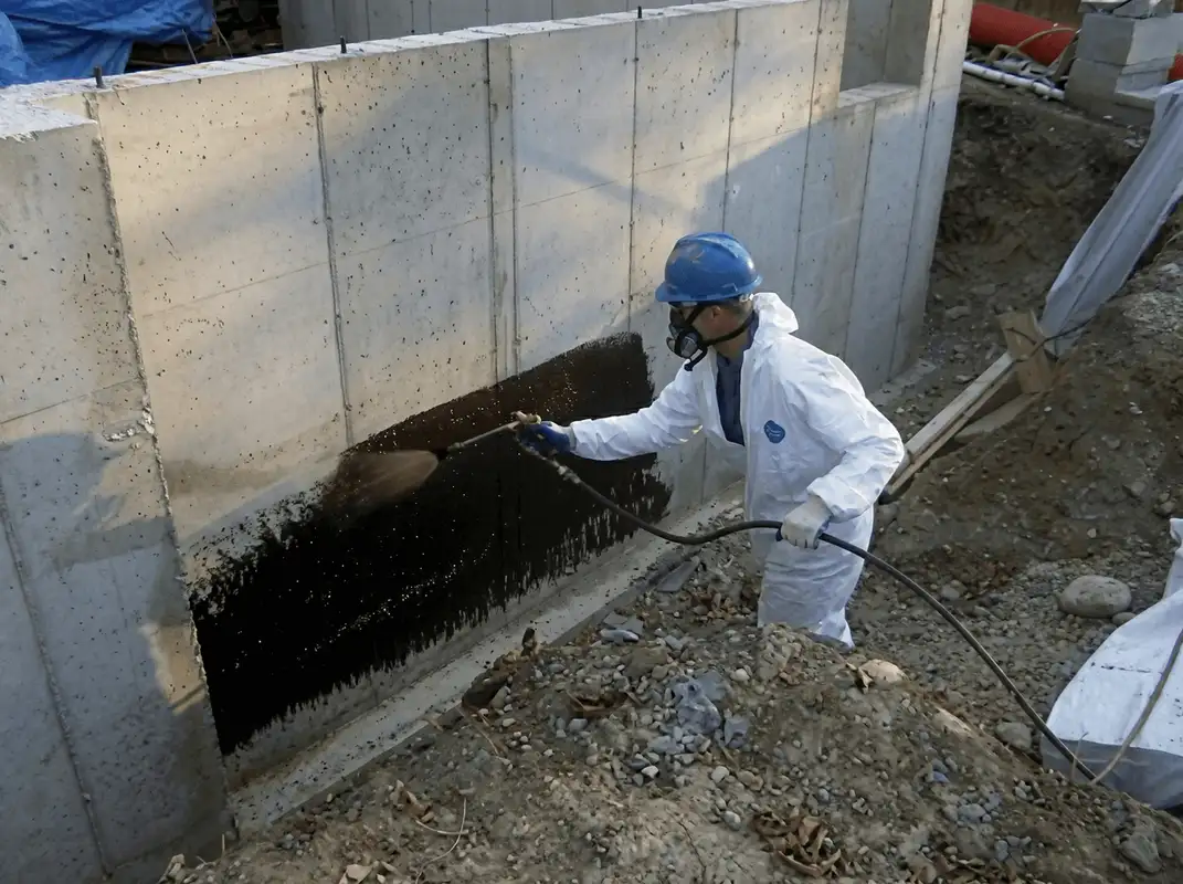 Professional waterproofing the exterior walls of the basement in Bradenton, FL